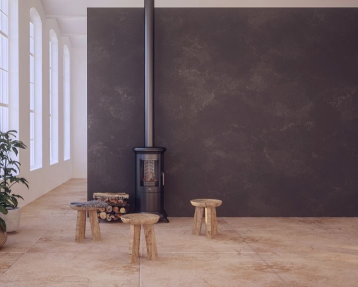 A city room with concrete walls and wooden stools.